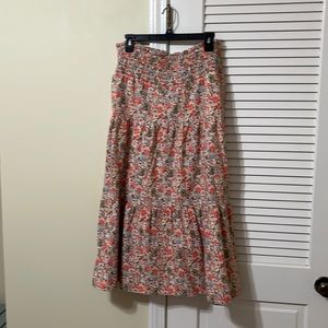 Multi colored floral smocked waist maxi skirt with pockets